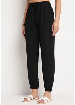 Czarne Luźne Spodnie z Gumką w Pasie i Kieszeniami Asnight ze sklepu Born2be Odzież w kategorii Spodnie damskie - zdjęcie 170924370