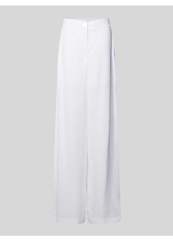 Spodnie materiałowe o rozkloszowanym kroju w jednolitym kolorze ze sklepu Peek&Cloppenburg  w kategorii Spodnie damskie - zdjęcie 170947314