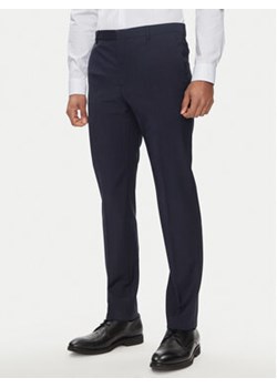 Calvin Klein Spodnie materiałowe K10K112936 Granatowy Slim Fit ze sklepu MODIVO w kategorii Spodnie męskie - zdjęcie 170968733