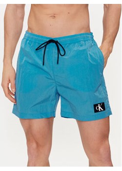 Calvin Klein Swimwear Szorty kąpielowe KM0KM00980 Niebieski Regular Fit ze sklepu MODIVO w kategorii Kąpielówki - zdjęcie 170969190
