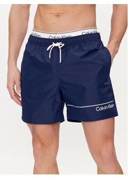 Calvin Klein Swimwear Szorty kąpielowe KM0KM00957 Granatowy Regular Fit ze sklepu MODIVO w kategorii Kąpielówki - zdjęcie 171005414