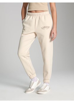 Sinsay - Spodnie dresowe - kremowy ze sklepu Sinsay w kategorii Spodnie damskie - zdjęcie 171015583