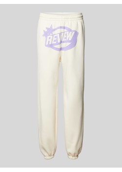 Spodnie dresowe z nadrukiem z logo ze sklepu Peek&Cloppenburg  w kategorii Spodnie damskie - zdjęcie 171032411