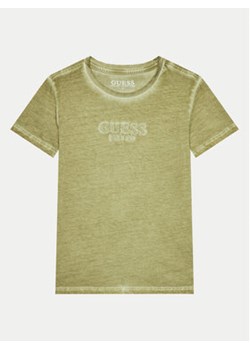 Guess T-Shirt L4GI30 K8HM4 Beżowy Regular Fit ze sklepu MODIVO w kategorii T-shirty chłopięce - zdjęcie 171041872