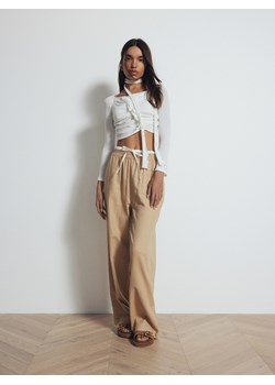 Reserved - Spodnie z lnem - beżowy ze sklepu Reserved w kategorii Spodnie damskie - zdjęcie 171148422