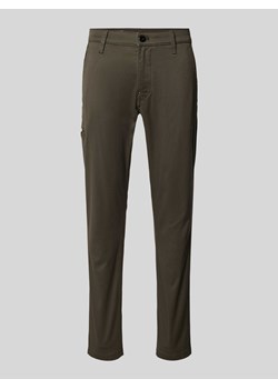 Chinosy o kroju skinny fit z detalem z logo ze sklepu Peek&Cloppenburg  w kategorii Spodnie męskie - zdjęcie 171149463