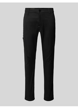 Chinosy o kroju skinny fit z detalem z logo ze sklepu Peek&Cloppenburg  w kategorii Spodnie męskie - zdjęcie 171173551