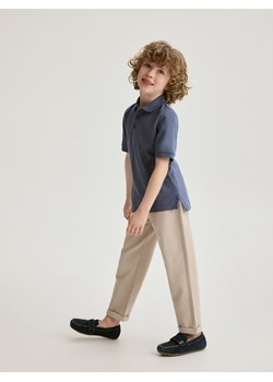 Reserved - Dzianinowe spodnie chino - beżowy ze sklepu Reserved w kategorii Spodnie chłopięce - zdjęcie 171185240