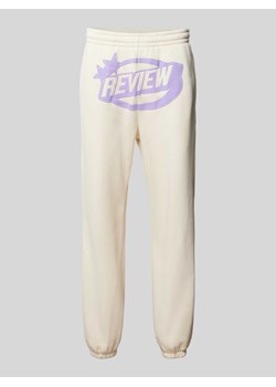 Spodnie dresowe o kroju regular fit z nadrukiem z logo ze sklepu Peek&Cloppenburg  w kategorii Spodnie męskie - zdjęcie 171206092