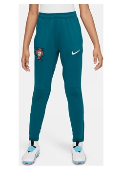 Dzianinowe spodnie piłkarskie dla dużych dzieci Nike Dri-FIT Portugalia Strike - Zieleń ze sklepu Nike poland w kategorii Spodnie chłopięce - zdjęcie 171206723