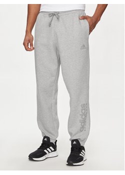 adidas Spodnie dresowe ALL SZN Fleece Graphic IW1198 Szary Regular Fit ze sklepu MODIVO w kategorii Spodnie męskie - zdjęcie 171212511