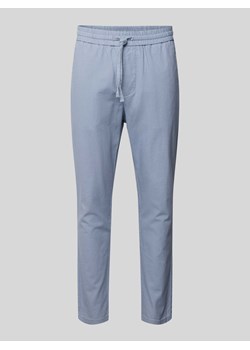 Spodnie o kroju tapered fit z dodatkiem streczu model ‘LINUS’ ze sklepu Peek&Cloppenburg  w kategorii Spodnie męskie - zdjęcie 171220271