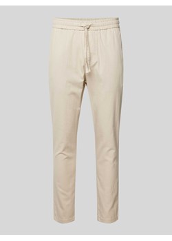 Spodnie o kroju tapered fit z dodatkiem streczu model ‘LINUS’ ze sklepu Peek&Cloppenburg  w kategorii Spodnie męskie - zdjęcie 171220293