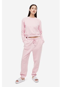 H & M - Spodnie dresowe z domieszką bawełny - Różowy ze sklepu H&M w kategorii Spodnie damskie - zdjęcie 171230312
