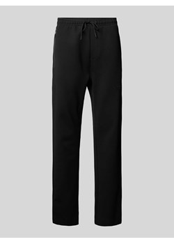 Spodnie dresowe z aplikacją z logo model ‘Hadim’ ze sklepu Peek&Cloppenburg  w kategorii Spodnie męskie - zdjęcie 171246170