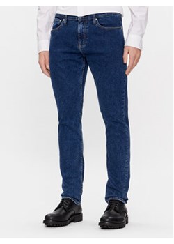 Calvin Klein Jeans Jeansy J30J324194 Granatowy Slim Fit ze sklepu MODIVO w kategorii Jeansy męskie - zdjęcie 171252724
