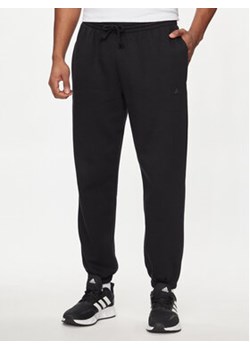 adidas Spodnie dresowe ALL SZN IW1184 Czarny Regular Fit ze sklepu MODIVO w kategorii Spodnie męskie - zdjęcie 171254003