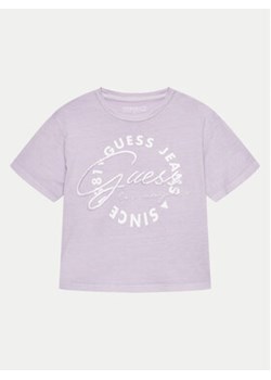 Guess T-Shirt J4GI30 K8HM4 Fioletowy Boxy Fit ze sklepu MODIVO w kategorii Bluzki dziewczęce - zdjęcie 171297470