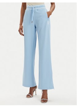 Juicy Couture Spodnie dresowe Kurt JCSBJ224418 Niebieski Regular Fit ze sklepu MODIVO w kategorii Spodnie damskie - zdjęcie 171297554