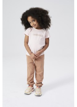 Różowy t-shirt dziewczęcy z brokatowym napisem - Śmieszka - 5.10.15. ze sklepu 5.10.15 w kategorii Bluzki dziewczęce - zdjęcie 171324740