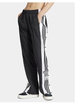 adidas Spodnie dresowe Adibreak IU2519 Czarny Regular Fit ze sklepu MODIVO w kategorii Spodnie damskie - zdjęcie 171343142