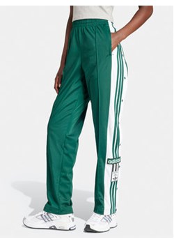 adidas Spodnie dresowe Adibreak IP0623 Zielony Regular Fit ze sklepu MODIVO w kategorii Spodnie damskie - zdjęcie 171345372