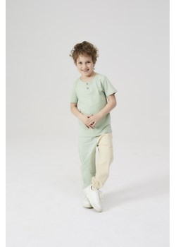 Dresowe spodnie regular dla chłopca - 5.10.15. ze sklepu 5.10.15 w kategorii Spodnie chłopięce - zdjęcie 171350051