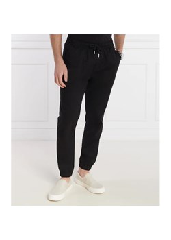 Tommy Jeans Spodnie jogger AUSTIN | Regular Fit ze sklepu Gomez Fashion Store w kategorii Spodnie męskie - zdjęcie 171359912