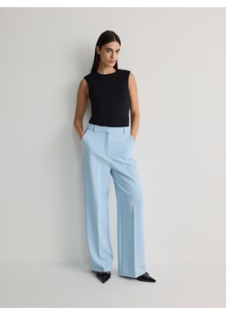 Reserved - Spodnie z kantem - jasnoniebieski ze sklepu Reserved w kategorii Spodnie damskie - zdjęcie 171378262