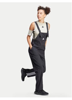adidas Kombinezon Dance All-Gender IN1816 Czarny Regular Fit ze sklepu MODIVO w kategorii Spodnie damskie - zdjęcie 171420210