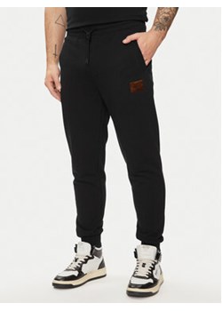 Hugo Spodnie dresowe Doak_V 50501021 Czarny Regular Fit ze sklepu MODIVO w kategorii Spodnie męskie - zdjęcie 171420600