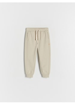 Reserved - Spodnie jogger - beżowy ze sklepu Reserved w kategorii Spodnie i półśpiochy - zdjęcie 171425624