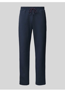 Spodnie dresowe o kroju regular fit z tunelem ze sklepu Peek&Cloppenburg  w kategorii Spodnie męskie - zdjęcie 171426493