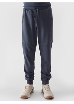 4F Spodnie dresowe w kolorze granatowym ze sklepu Limango Polska w kategorii Spodnie chłopięce - zdjęcie 171433164