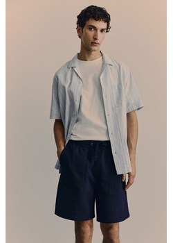 H & M - Szorty dresowe Regular Fit - Niebieski ze sklepu H&M w kategorii Spodenki męskie - zdjęcie 171438301