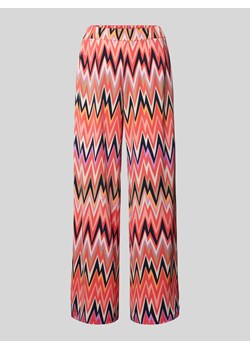 Spodnie z graficznym wzorem i wpuszczanymi kieszeniami ze sklepu Peek&Cloppenburg  w kategorii Spodnie damskie - zdjęcie 171447462