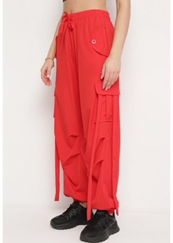 Czerwone Spodnie Bojówki o Luźnym Kroju ze Sznurkami po Bokach Tizelle ze sklepu Born2be Odzież w kategorii Spodnie damskie - zdjęcie 171462861