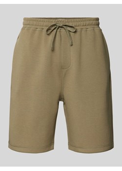 Spodnie dresowe o kroju regular fit z tunelem model ‘Salomon’ ze sklepu Peek&Cloppenburg  w kategorii Spodenki męskie - zdjęcie 171478401