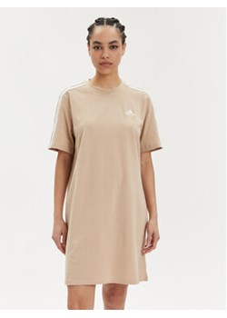 adidas Sukienka codzienna Essentials 3-Stripes IR6056 Beżowy Loose Fit ze sklepu MODIVO w kategorii Sukienki - zdjęcie 171499504