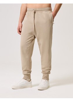 Spodnie Dresowe CLTN DROP 7 Piasek S ze sklepu Diverse w kategorii Spodnie męskie - zdjęcie 171505224