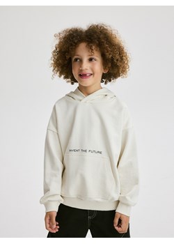 Reserved - Bluza oversize z kapturem - złamana biel ze sklepu Reserved w kategorii Bluzy chłopięce - zdjęcie 171513100