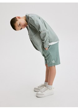 Reserved - Bawełniane szorty z kieszeniami - jasnozielony ze sklepu Reserved w kategorii Spodenki chłopięce - zdjęcie 171515994