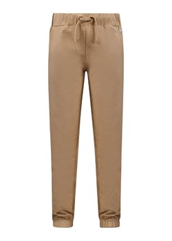 Retour Spodnie dresowe &quot;Calias&quot; w kolorze beżowym ze sklepu Limango Polska w kategorii Spodnie dziewczęce - zdjęcie 171526571