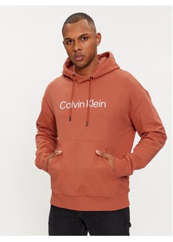 Calvin Klein Bluza Hero K10K111345 Pomarańczowy Regular Fit ze sklepu MODIVO w kategorii Bluzy męskie - zdjęcie 171529492