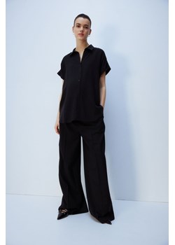 H & M - MAMA Bluzka z wiązanym paskiem - Czarny ze sklepu H&M w kategorii Bluzki ciążowe - zdjęcie 171537261