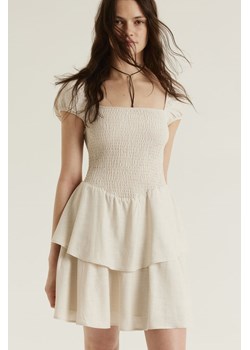 H & M - Falbaniasta sukienka z elastycznym marszczeniem - Beżowy ze sklepu H&M w kategorii Sukienki - zdjęcie 171537561