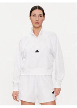 adidas Bluza Z.N.E. IN9478 Biały Loose Fit ze sklepu MODIVO w kategorii Bluzy damskie - zdjęcie 171537831