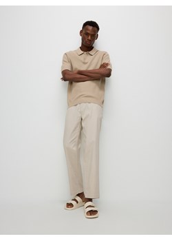 Reserved - Bawełniane spodnie slim - beżowy ze sklepu Reserved w kategorii Spodnie męskie - zdjęcie 171580620