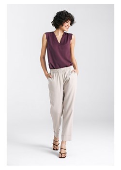 Nife Spodnie w kolorze beżowym ze sklepu Limango Polska w kategorii Spodnie damskie - zdjęcie 171586203