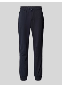 Spodnie dresowe z kieszeniami z tyłu model ‘JOSHUA’ ze sklepu Peek&Cloppenburg  w kategorii Spodnie męskie - zdjęcie 171703260